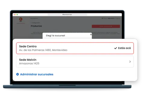 Notebook con el panel de un gimnasio en EasySocio y la ventana para cambiar de sucursal. Una tarjeta amplía las dos sedes del gimnasio, cada una con su dirección, y el enlace para administrarlas.